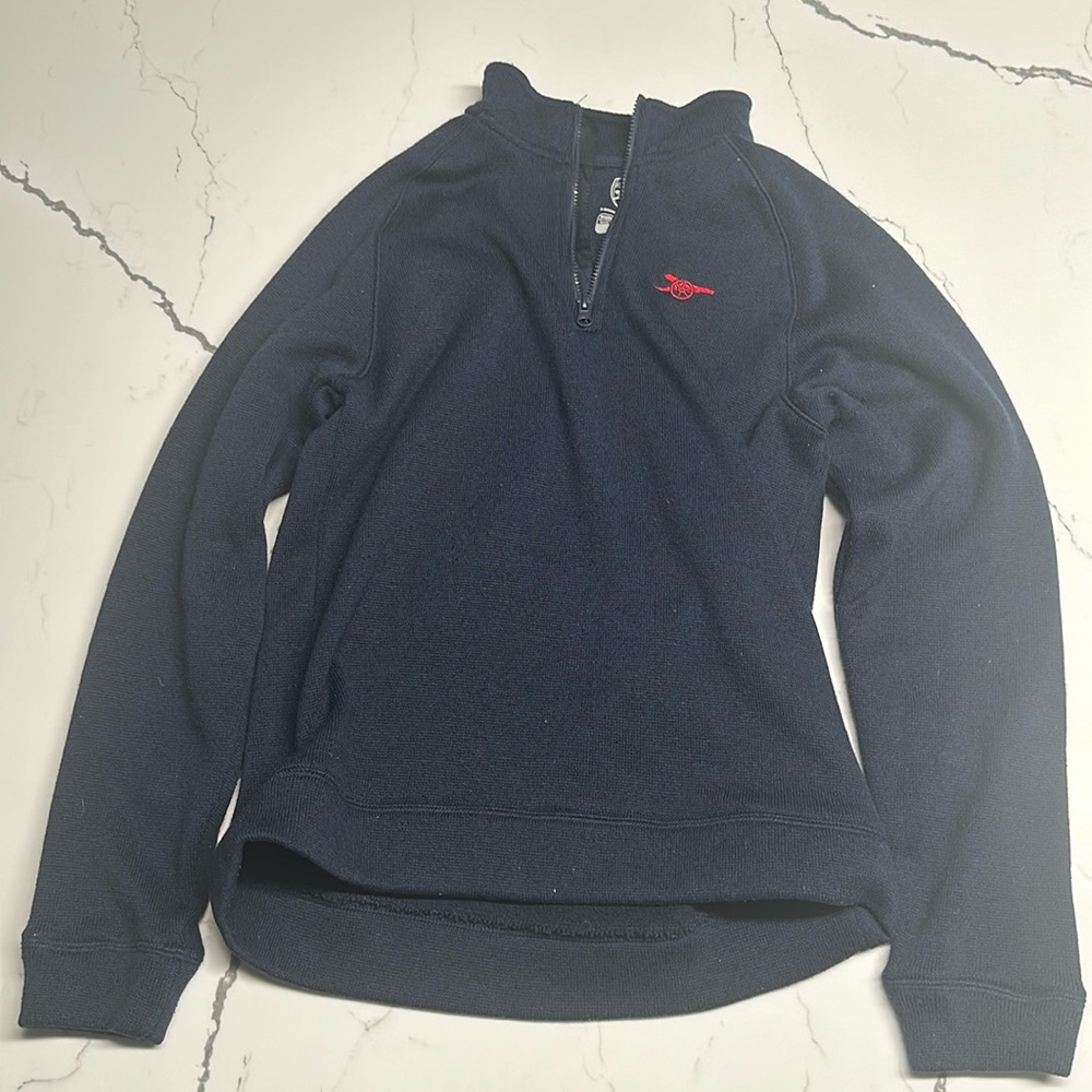 I am selling this Arsenal sweater. Arsenal is a professional soccer team.